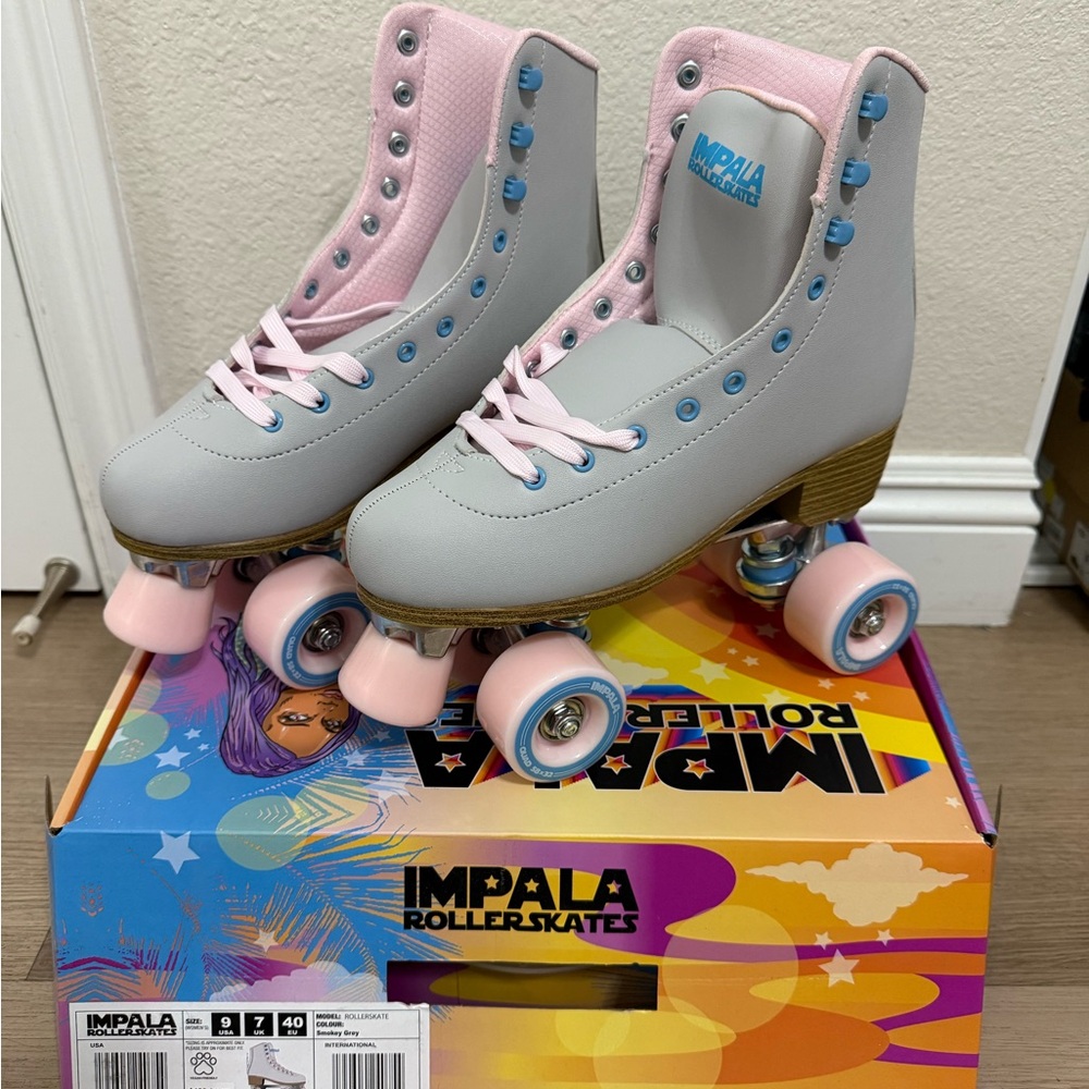 Gray and Pink Roller Skates with Artistic Design